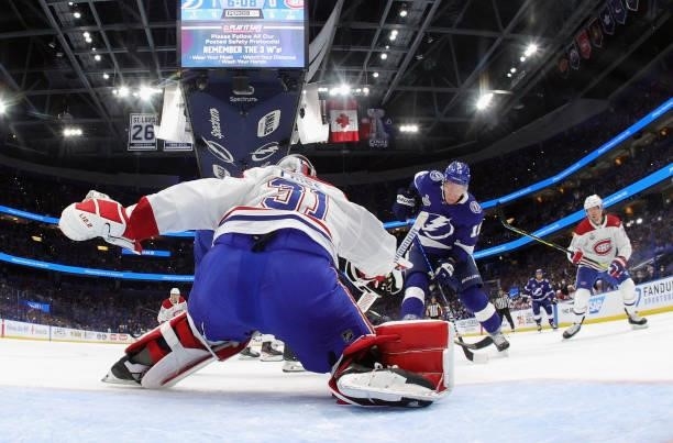 Carey Price of the Montreal Canadiens defends against Ondrej Palat of the Tampa Bay Lightning during Game One of the 2021 NHL Stanley Cup Finals...