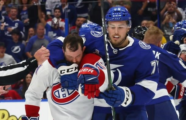 Ross Colton of the Tampa Bay Lightning holds onto Paul Byron of the Montreal Canadiens during Game One of the 2021 NHL Stanley Cup Finals against the...