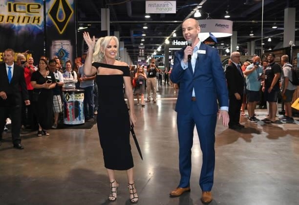 Jenny McCarthy and Vice President of Bar & Restaurant Group Tim McLucas cut the ribbon during Day 2 of the 35th Annual Nightclub & Bar Show and World...
