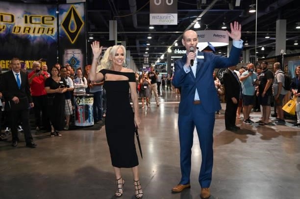Jenny McCarthy and Vice President of Bar & Restaurant Group Tim McLucas cut the ribbon during Day 2 of the 35th Annual Nightclub & Bar Show and World...