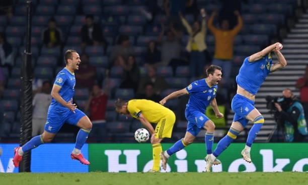 Ukraine player Artem Dovbyk celebrates after scoring the winning goal during the UEFA Euro 2020 Championship Round of 16 match between Sweden and...