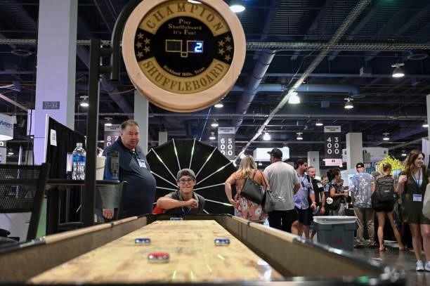 Guest plays shuffleboard during Day 2 of the 35th Annual Nightclub & Bar Show and World Tea Expo at the Las Vegas Convention Center on June 29, 2021...