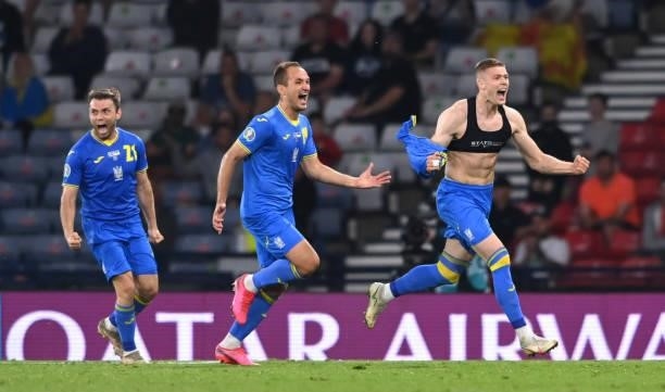 Ukraine player Artem Dovbyk celebrates after scoring the winning goal during the UEFA Euro 2020 Championship Round of 16 match between Sweden and...