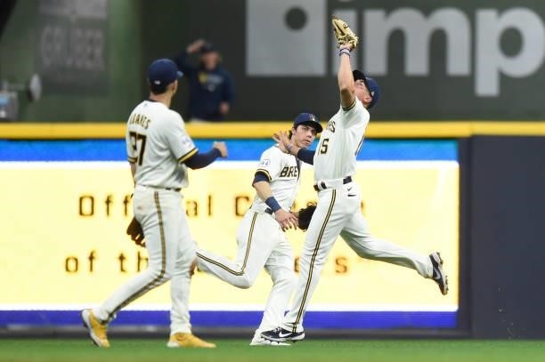 Tyrone Taylor of the Milwaukee Brewers catches a fly ball hit by Eric Sogard of the Chicago Cubs in the third inning at American Family Field on June...