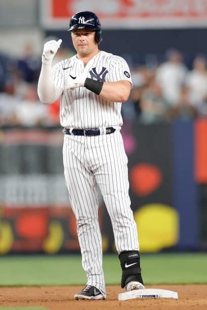 Luke Voit of the New York Yankees reacts after hitting a two-RBI double during the fourth inning against the Los Angeles Angels at Yankee Stadium on...