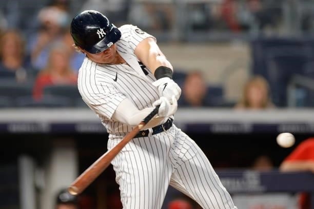 Luke Voit of the New York Yankees hits a two-RBI double during the fourth inning against the Los Angeles Angels at Yankee Stadium on June 29, 2021 in...