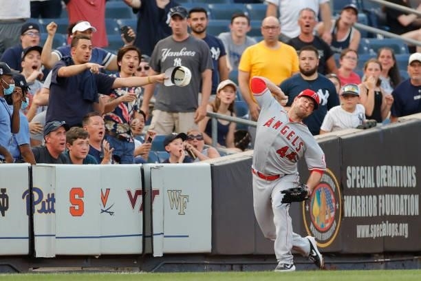 Scott Schebler of the Los Angeles Angels throws from the outfield during the second inning against the New York Yankees at Yankee Stadium on June 29,...