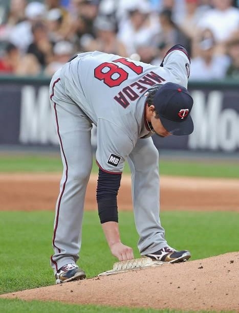 Starting pitcher Kenta Maeda of the Minnesota Twins touches the rosin bag before throwing the ball against the Chicago White Sox at Guaranteed Rate...