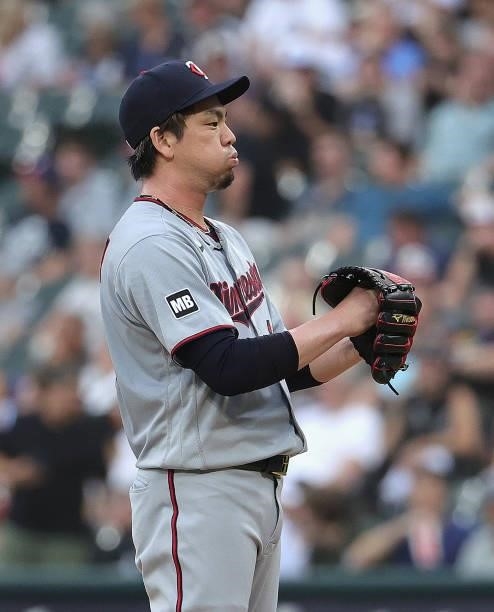 Starting pitcher Kenta Maeda of the Minnesota Twins readies to throw the ball against the Chicago White Sox at Guaranteed Rate Field on June 29, 2021...