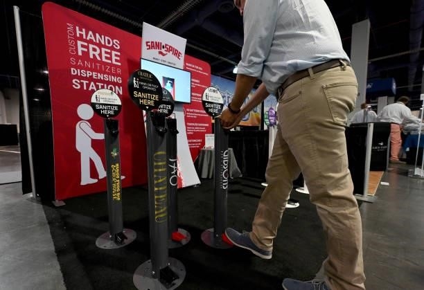 Guest uses Sani-Spire during Day 2 of the 35th Annual Nightclub & Bar Show and World Tea Expo at the Las Vegas Convention Center on June 29, 2021 in...
