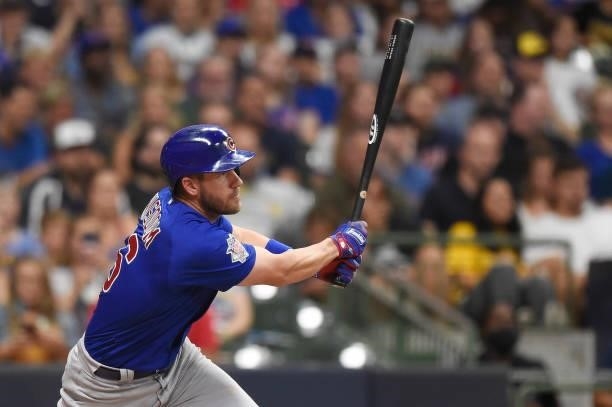 Patrick Wisdom of the Chicago Cubs hits an RBI double in the fourth inning against the Milwaukee Brewers at American Family Field on June 29, 2021 in...