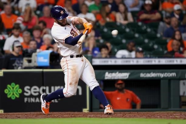 Abraham Toro of the Houston Astros singles to center field scoring two during the fifth inning against the Baltimore Orioles at Minute Maid Park on...
