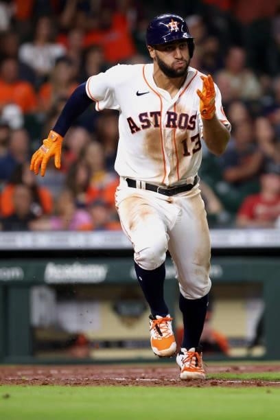 Abraham Toro of the Houston Astros runs to first after hitting a single to center field scoring two during the fifth inning against the Baltimore...