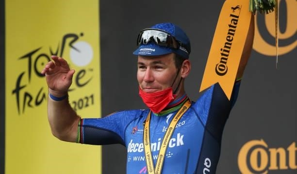 Stage winner Mark Cavendish of Great Britain and Deceuninck - Quick Step celebrates his victory during the podium ceremony of stage 4 of the 108th...