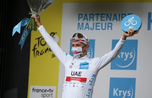 Tadej Pogacar of Slovenia and UAE Team Emirates retains the white jersey of best young rider during the podium ceremony of stage 4 of the 108th Tour...