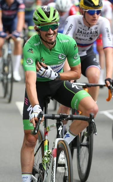 Julian Alaphilippe of France and Deceuninck Quick Step smiles when learning of teammate Mark Cavendish of Great Britain victory during stage 4 of the...