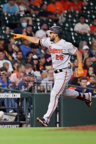 Anthony Santander of the Baltimore Orioles gestures to the dugout after hitting a home run during the eighth inning against the Houston Astros at...