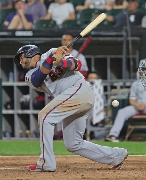 Nelson Cruz of the Minnesota Twins strikes out in the 9th inning against the Chicago White Sox at Guaranteed Rate Field on June 29, 2021 in Chicago,...