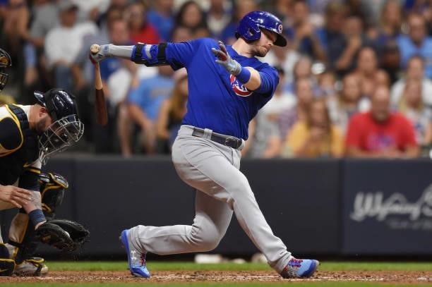 Ian Happ of the Chicago Cubs strikes out swinging with the bases loaded in the seventh inning against the Milwaukee Brewers at American Family Field...
