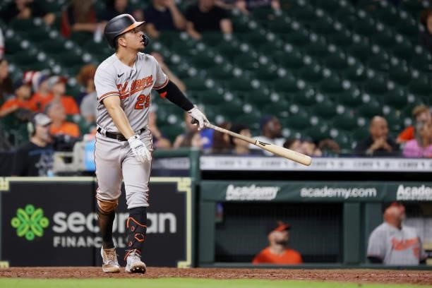 Ramon Urias of the Baltimore Orioles watches his RBI home run during the ninth inning against the Houston Astros at Minute Maid Park on June 29, 2021...