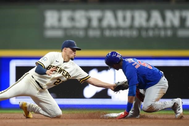 Sergio Alcantara of the Chicago Cubs steals second base against Willy Adames of the Milwaukee Brewers in the third inning at American Family Field on...
