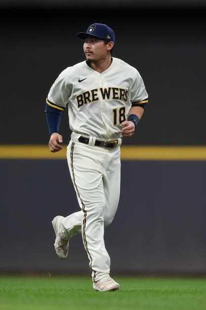 Keston Hiura of the Milwaukee Brewers warms up before a game against the Chicago Cubs at American Family Field on June 29, 2021 in Milwaukee,...