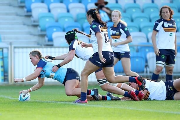 Arabella McKenzie of the Waratahs scores a try during the round three Super W match between the NSW Waratahs and the ACT Brumbies at Coffs Harbour...