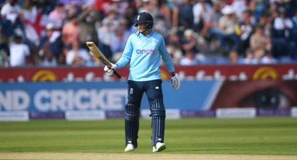 Joe Root of England raises his bat after scoring 50 runs during the 1st One Day International match between England and Sri Lanka at Emirates...