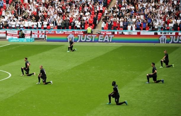 Team kneels beore the UEFA Euro 2020 Championship Round of 16 match between England and Germany at Wembley Stadium on June 29, 2021 in London,...