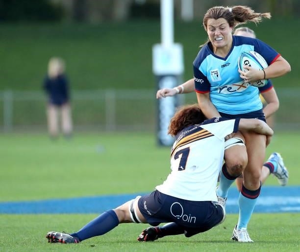 Grace Hamilton of the Waratahs is tackled by Rebecca Symth of the Brumbies during the round three Super W match between the NSW Waratahs and the ACT...