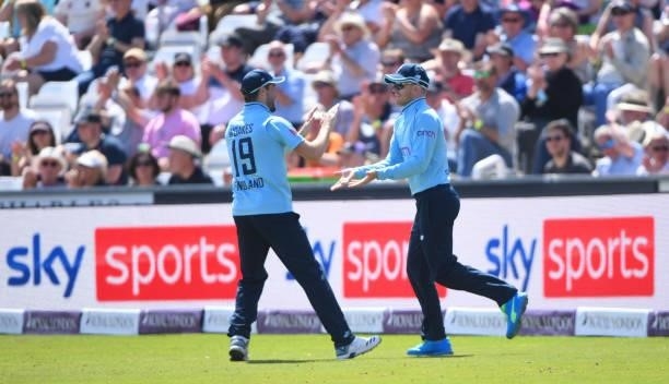 Chris Woakes of England celebrates as Sam Billings takes a catch on the boundary during the 1st One Day International match between England and Sri...
