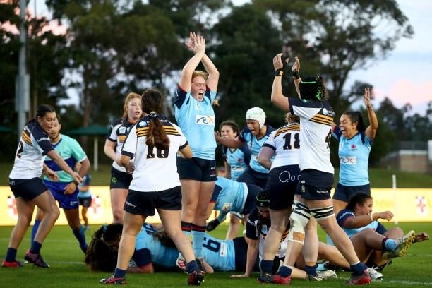 Brianna Hoy of the Waratahs celebrates the team's try in the final minutes during the round three Super W match between the NSW Waratahs and the ACT...