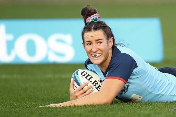 Maya Stewart of the Waratahs scores a try during the round three Super W match between the NSW Waratahs and the ACT Brumbies at Coffs Harbour...