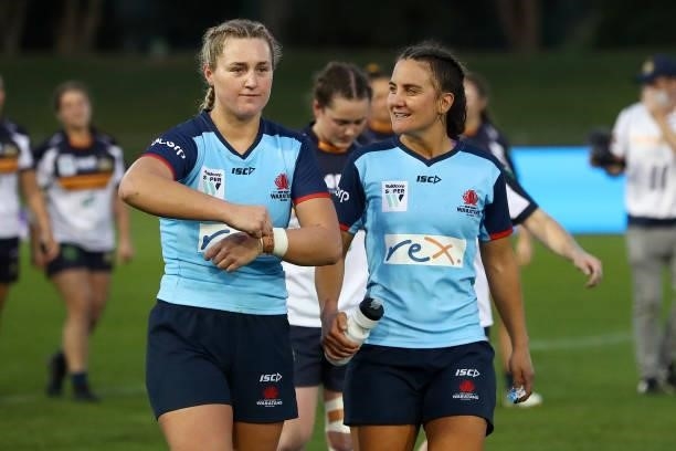 Arabella McKenzie of the Waratahs and Katrina Barker of the Waratahs look on after the win during the round three Super W match between the NSW...