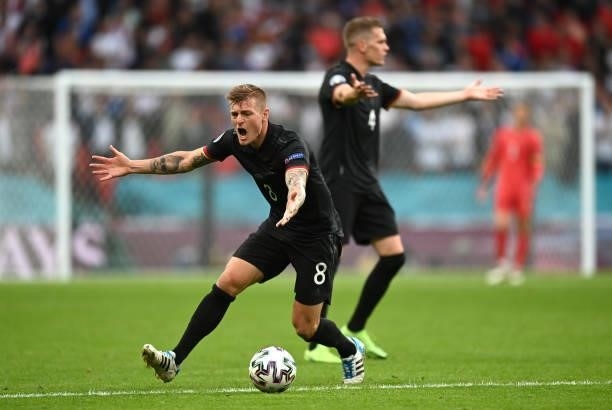 Toni Kroos of Germany reacts during the UEFA Euro 2020 Championship Round of 16 match between England and Germany at Wembley Stadium on June 29, 2021...