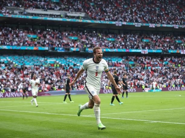 Harry Kane of England celebrates after scoring his team's second goal during the UEFA Euro 2020 Championship Round of 16 match between England and...