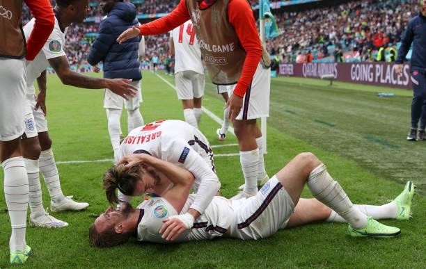 Harry Kane of England celebrates with teammate Jack Grealish after scoring his team's second goal during the UEFA Euro 2020 Championship Round of 16...