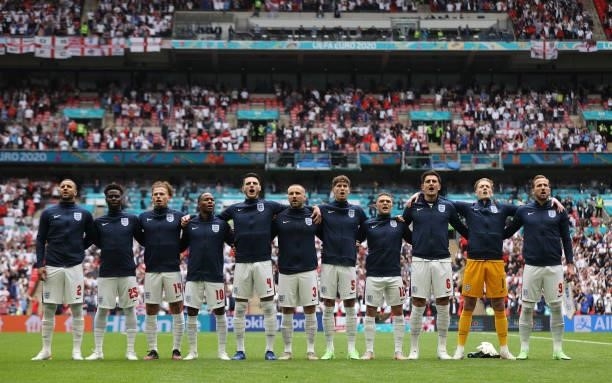 The England players sing the national anthem prior to the UEFA Euro 2020 Championship Round of 16 match between England and Germany at Wembley...
