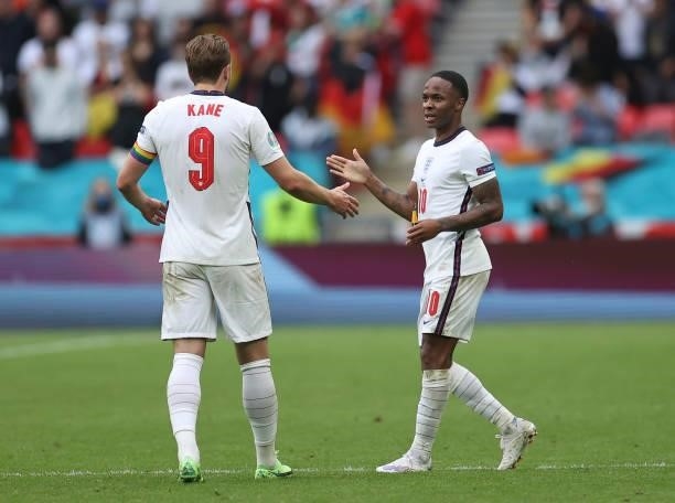 Harry Kane and Raheem Sterling of England celebrate following their team's victory in the UEFA Euro 2020 Championship Round of 16 match between...
