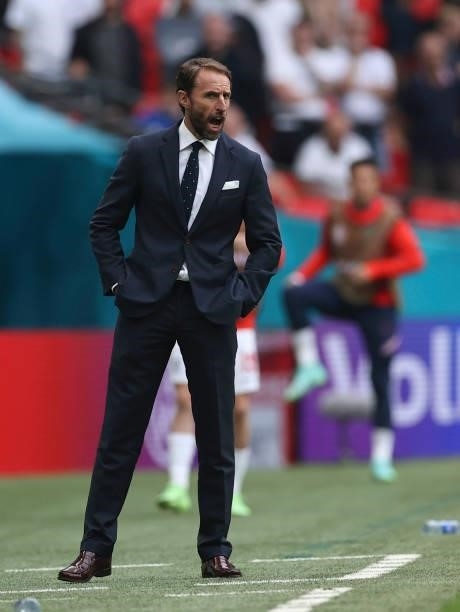 Gareth Southgate, Head Coach of England gives his team instructions during the UEFA Euro 2020 Championship Round of 16 match between England and...
