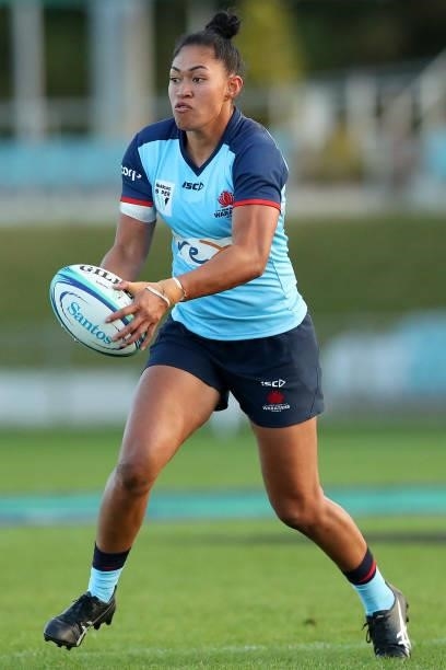 Pauline Piliane of the Waratahs runs with the ball during the round three Super W match between the NSW Waratahs and the ACT Brumbies at Coffs...