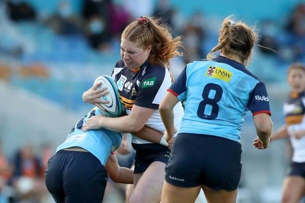 Grace Kemp of the Brumbies runs with the ball during the round three Super W match between the NSW Waratahs and the ACT Brumbies at Coffs Harbour...