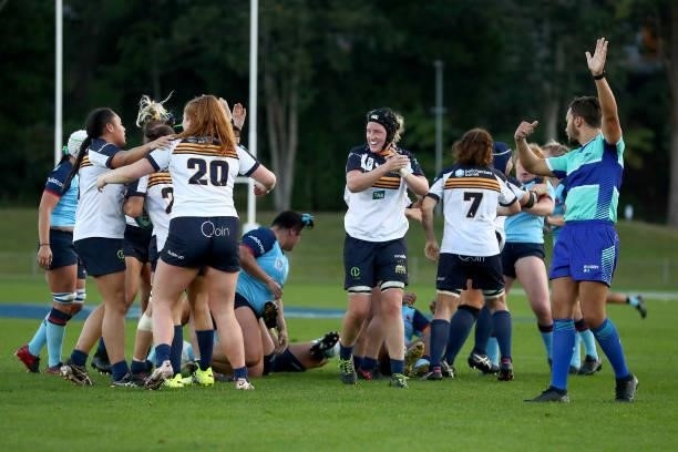 Emily Sogal of the Brumbies celebrates with team mates during the round three Super W match between the NSW Waratahs and the ACT Brumbies at Coffs...