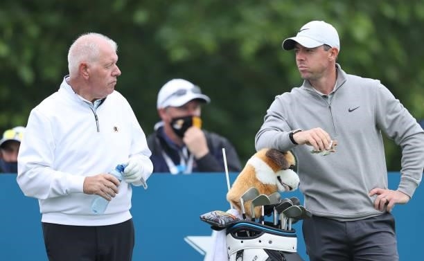 Rory McIlroy of Northern Ireland chats with his father, Gerry McIlroy in the pro am ahead of the Dubai Duty Free Irish Open at Mount Juliet Golf Club...