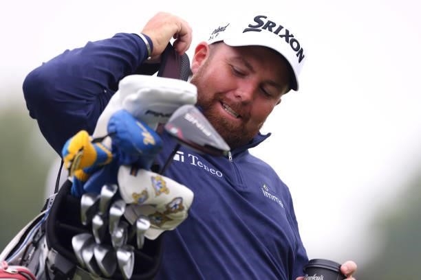 Shane Lowry of Ireland carries his own bag as he participates in the pro am during a practice day prior to The Dubai Duty Free Irish Open at Mount...