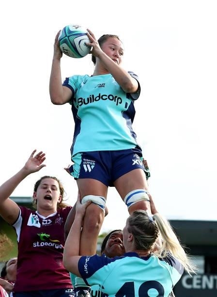 Hana Lane of the President's XV wins a line-out ball during the round three Super W match between the NSW Waratahs and the ACT Brumbies at Coffs...