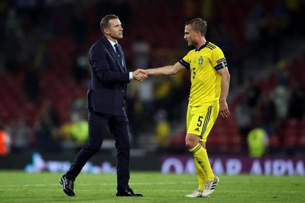 Ukriane manager Andriy Shevchenko shakes hands with Pierre Bengtsson of Sweden following the UEFA Euro 2020 Championship Round of 16 match between...