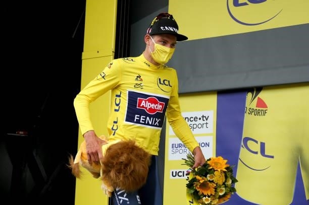 Mathieu van der Poel of Netherlands and Alpecin - Fenix retains the yellow jersey of race's leader during the trophy ceremony of stage 5 of the 108th...