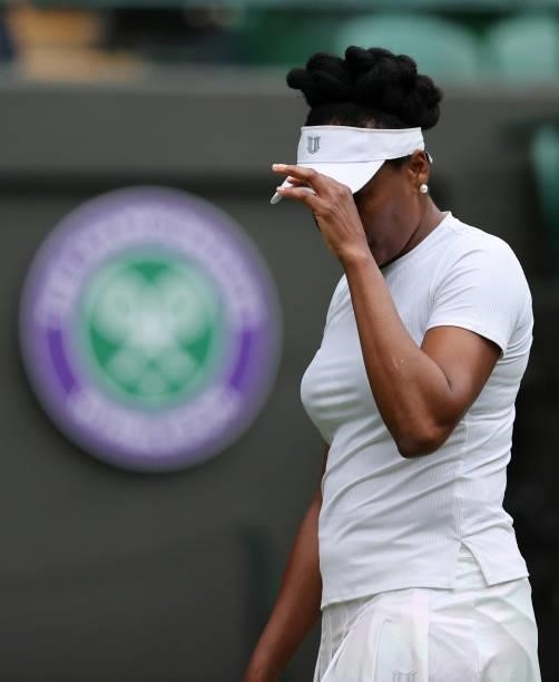 Venus Williams of The United States reacts in her Ladies' Singles Second Round match against Ons Jabeur of Tunisia during Day Three of The...