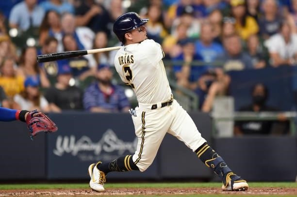 Luis Urias of the Milwaukee Brewers hits a two-run home run against the Chicago Cubs in the second inning at American Family Field on June 30, 2021...